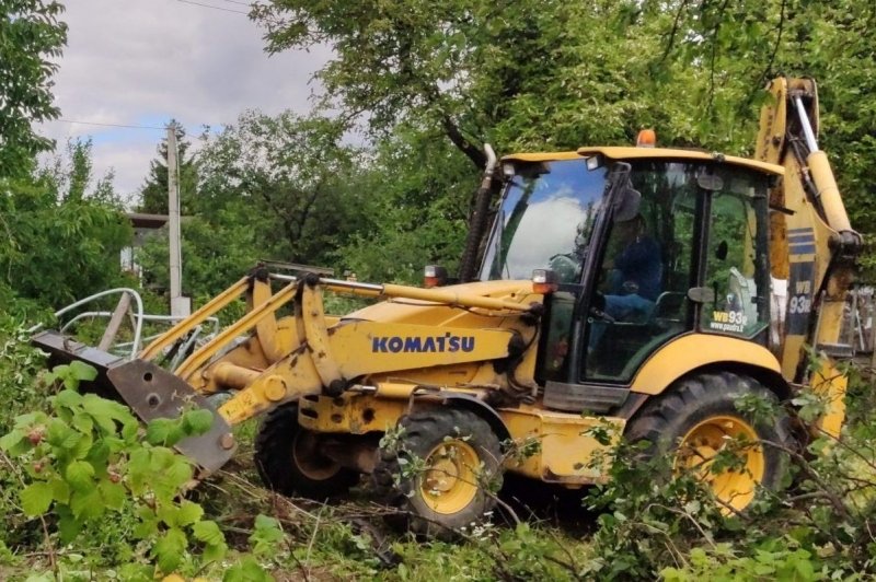 griovimo darbai ekskavatorius žolės